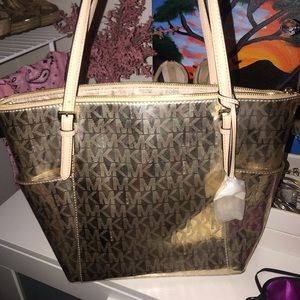 Gold Michael Kors handbag